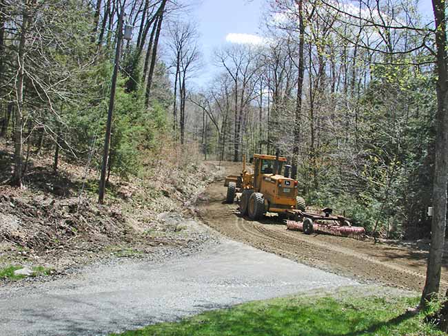 The Road Grader Cometh